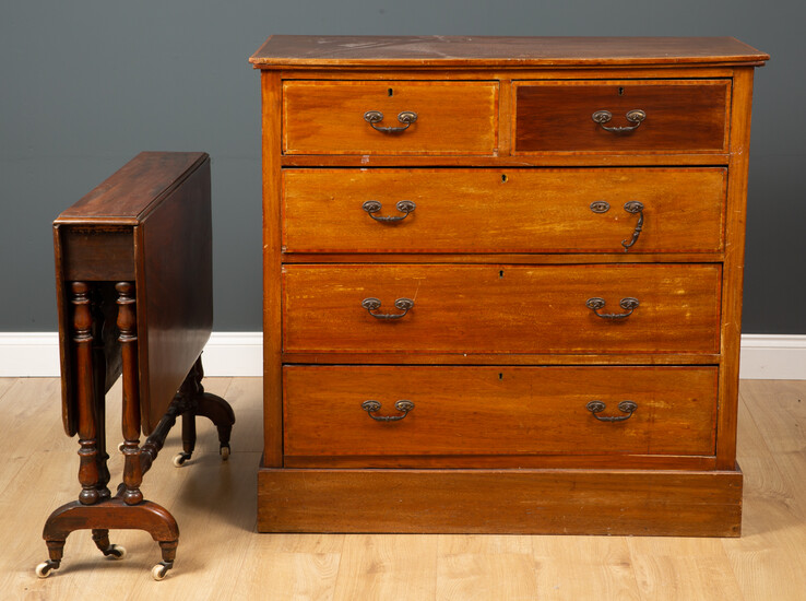 An Edwardian mahogany chest of two short and three long...