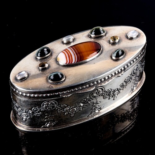 An Edwardian silver gem set dressing table box, oval form wi...