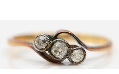 An antique 18ct gold and old cut diamond three stone ring, l...
