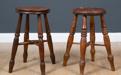 An antique turned elm stool