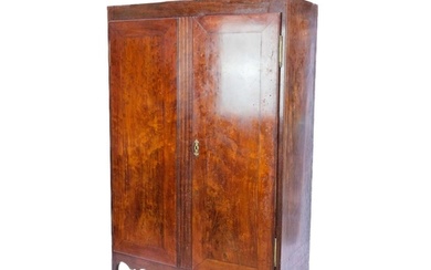 An early 20th century French fruit wood wardrobe. With twin ...