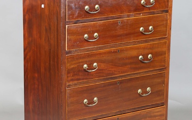 An early 20th century George III style mahogany narrow chest of six drawers with boxwood stringing