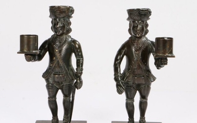 An unusual pair of bronze figural ‘Bergmannleuchter’ candlesticks, German, mid-18th century, each in