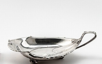 Art Nouveau bowl. Standing on three ball feet....