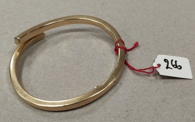 Bracelet jonc rigide ouvrant en or jaune 750°/°°. (déformation). poids: 15.6grs
