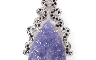 CARVED TANZANITE, STERLING, AND CRYSTAL PENDANT