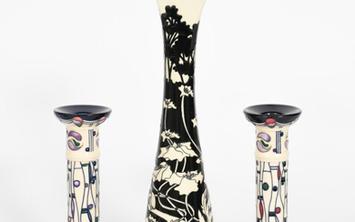 'Charles Rennie Mackintosh' a pair of Moorcroft Pottery candlesticks