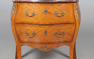 Chest of drawers with stone top, rococo style.