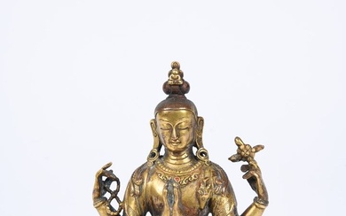 Chine-Tibet, fin XIXe-début XXe siècle. Sujet en bronze de patine dorée représentant Sadaksari-Avalokiteshvara (Tchenrezig) à...