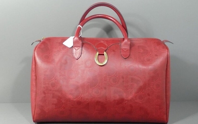 Christian Dior travel bag in burgundy leather