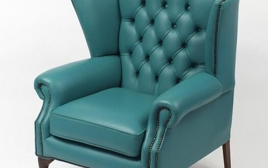Contemporary wingback armchair with turquoise leather