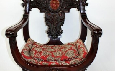 Continental carved mahogany armchair with griffins