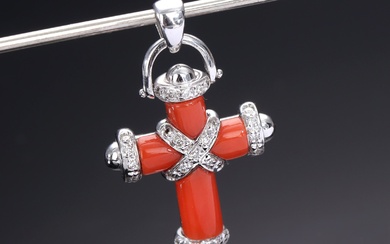 Coral and diamond cross of 18 kt. white gold