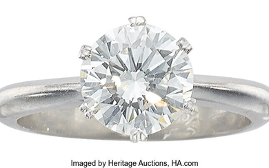 Diamond, Platinum Ring Stones: Round brilliant-cut diamond weighing 1.64...