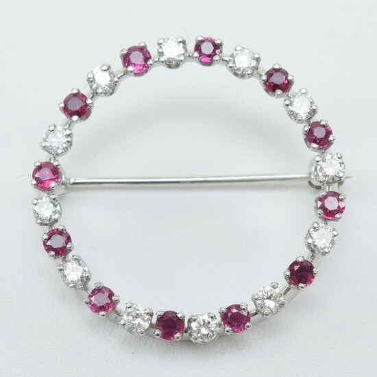 Diamond and Ruby brooch, 14k white gold. Contains 12