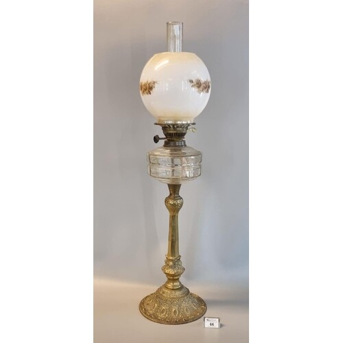 Early 20th Century brass double burner oil lamp with clear g...