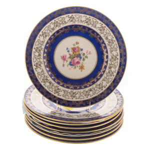 Eight floral decorated porcelain plates