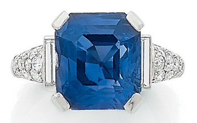 Elegant platinum ring (850) centered on an emerald-cut...
