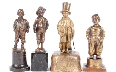 FOUR FIGURAL STATUES OF WHIMSICAL CHILDREN