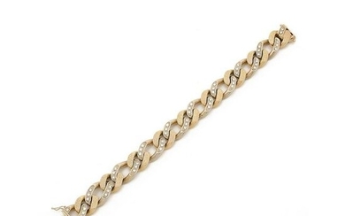 Flexible bracelet in two-toned 18k gold (750‰) with curb links alternating smooth and