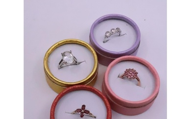 Four gold gem set rings approx. 10 grams, finger size P Half...