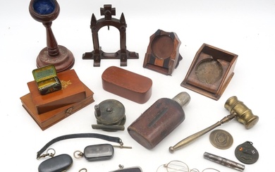 Four various treen pocket watch stands, a pair of yellow met...
