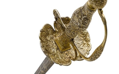 GALADEGENAllemand, vers 1760/70.Garde en argent doré, composée de pièces moulées et forgées. Le pommeau est...