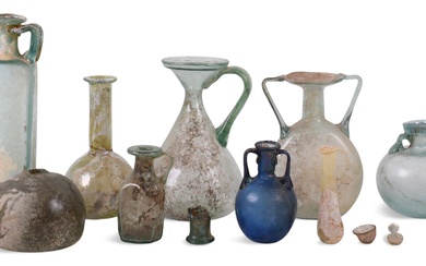 GROUP OF 13 ROMAN GLASS BOTTLES AND VESSELS, 1ST TO 4TH CENTURY CE