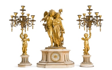 Garniture de cheminée en albâtre et bronze doré, comprenant une pendule et deux candélabres, les...