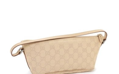 NOT SOLD. Gucci: An "Accessory Pouch" hand bag of beige monogram canvas wth one zip...