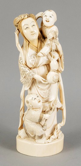 Ivory figure of a woman with 2 boys,...