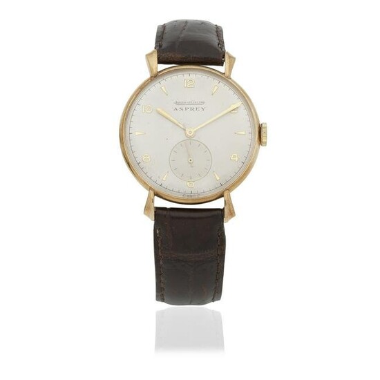 Jaeger-LeCoultre. A 9K gold manual wind wristwatch retailed by Asprey London Hallmark for 1960,...