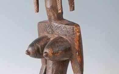 Lot details * A large ancestor figure, carved as...