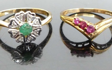 Lot details An 18ct gold, emerald and diamond point set...