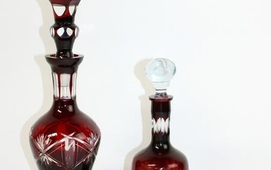 Lot of 2 cranberry to clear glass decanters