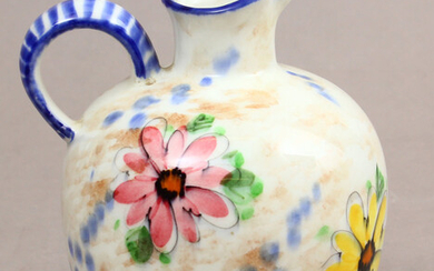 Majolica pitcher "Flowers" First half of 20th century. Majolica, hand-painted. 14.5 cm, with defect.