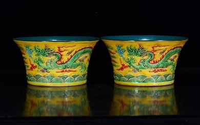 Ming Zhengde era famille rose carved dragon and phoenix pattern bowl