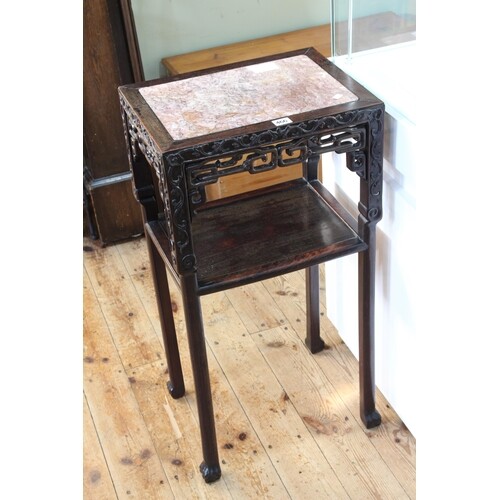 Oriental hardwood and marble inset two tier table, 81.5cm by...
