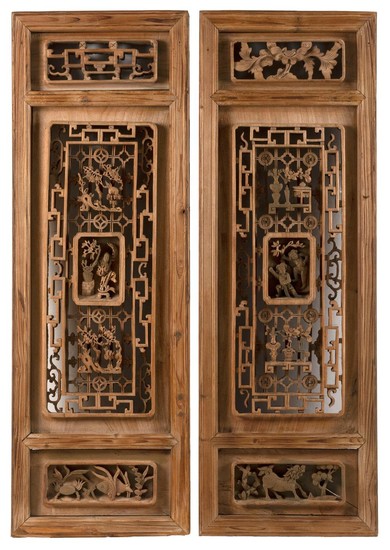 PAIR OF CHINESE CARVED WOOD PANELS Openwork-carved figural, floral and Greek fret design. Heights 36". Widths 12". Depths 2".