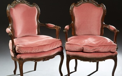 Pair of French Louis XV Style Carved Walnut Upholstered