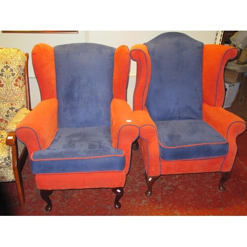 Pair of "His 'n Hers" Wing Back Armchairs.