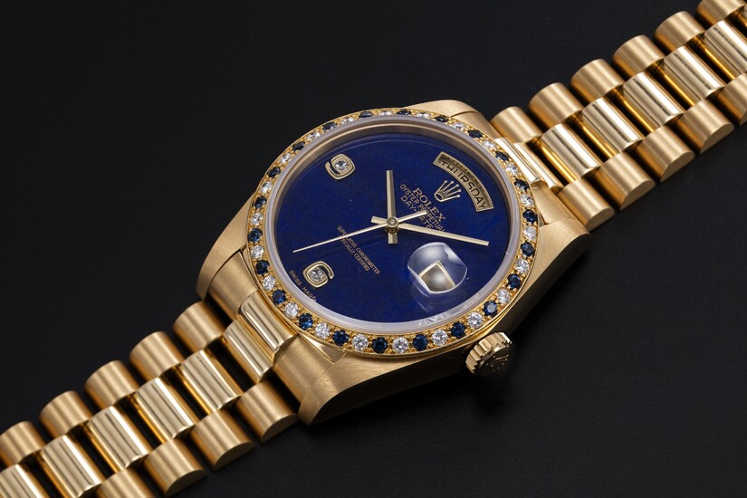 ROLEX, A GOLD OYSTER PERPETUAL DAY-DATE WITH SAPPHIRE AND DIAMOND CRUSTED BEZEL AND LAPIS-LAZULI DIAL, REF. 18148