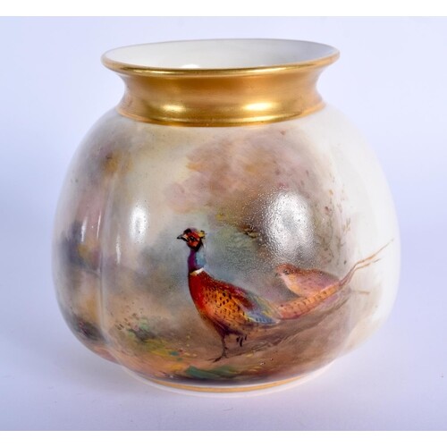 Royal Worcester vase of moulded spherical shape painted with...