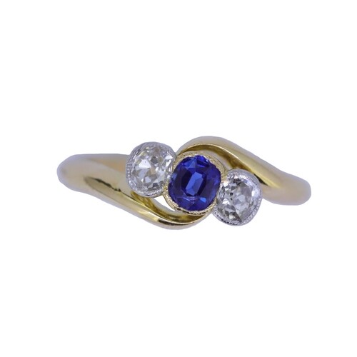 SAPPHIRE AND DIAMOND 3-STONE RING, set with a central blue s...