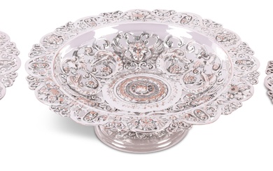 SET OF THREE E.F. CALDWELL & CO. (NEW YORK) RENAISSANCE REVIVAL TAZZAE, TWO SILVER PLATED ONE SILVER, LAST QUARTER OF 19TH CENTURY Height: 3 1/4 in. (8.3 cm.), Diameter: 11 in. (27.9 cm.)