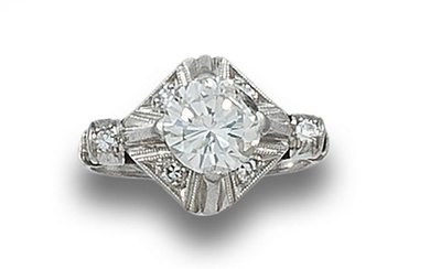 SOLITAIRE, OLD STYLE, DIAMOND, ESTIMATED AT 1.30 CT. AND PLATINUM
