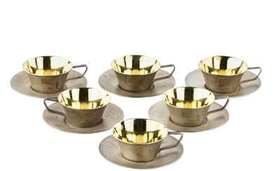 Six silver cups with saucers, gilded and engraved. USSR. 1960-80s