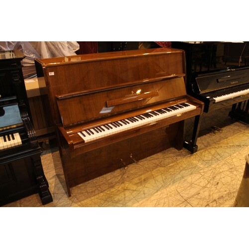 Steinway (c1968) A Model V upright piano in a mahogany case;...