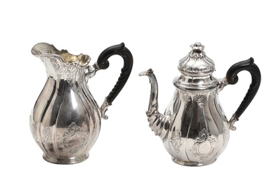 Sterling silver coffee pot and milk jug, richtly decorated with rocailles, flowers...