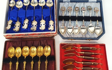 TWO SETS OF THAI TEASPOONS; one white metal (6) and other brass (6)